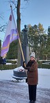 Presidentti Annina Kuusiniemi ja Auroran lippu