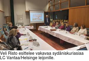 Veli Risto esittelee vakavaa sydniskuriasiaa LC Vantaa/Helsinge leijonille.