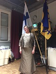 Liisa Vahtera poseeraa lippujen kanssa.