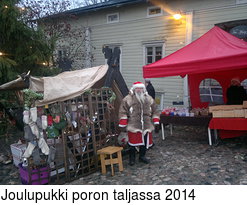 Joulupukki poron taljassa 2014