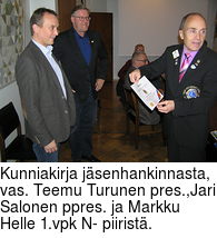 Kunniakirja jäsenhankinnasta, vas. Teemu Turunen pres.,Jari Salonen ppres. ja Markku Helle 1.vpk N- piiristä.
